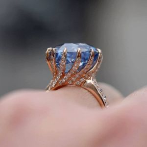 Rose Gold Rotate Shaped Round Cut Engagement Ring