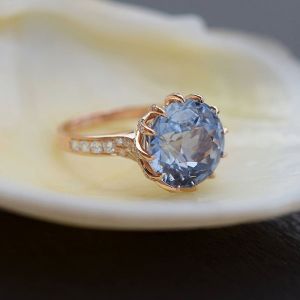 Rose Gold Rotate Shaped Round Cut Engagement Ring