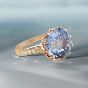 Rose Gold Rotate Shaped Round Cut Engagement Ring
