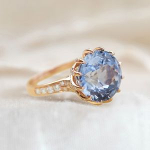 Rose Gold Rotate Shaped Round Cut Engagement Ring