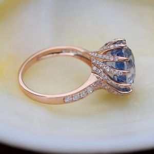 Rose Gold Rotate Shaped Round Cut Engagement Ring