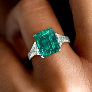 Three Stone Emerald & Trillion Cut Engagement Ring