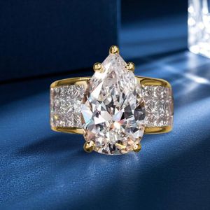Golden Pave Shank Pear Cut Engagement Ring