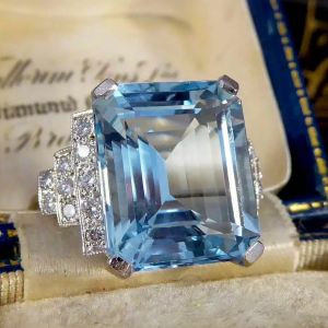 Brilliant Emerald Cut Aquamarine Sapphire Engagement Ring