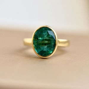Solitaire Golden Oval Cut Emerald Sapphire Engagement Ring