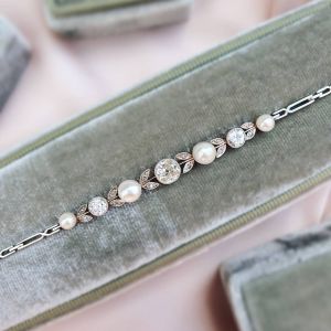 Elegant Round Cut Pearl & White Sapphire Bracelet