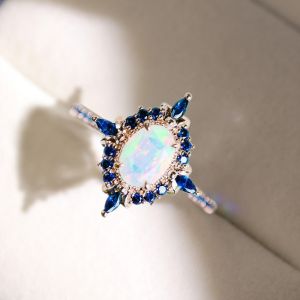 Rose Gold Halo Oval Cut Opal & Blue Sapphire Engagement Ring For Women