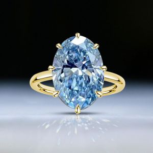 Golden Solitaire Oval Cut Aquamarine Sapphire Engagement Ring