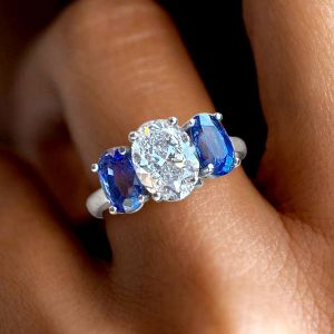 Three Stone Oval Cut White & Blue Sapphire Engagement Ring