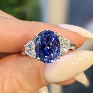 Three Stone Oval Cut Blue Sapphire Engagement Ring For Women 