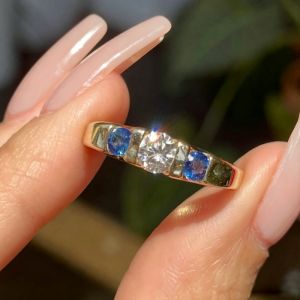 Gold Three Stone Round Cut Blue Sapphire Engagement Ring For Women