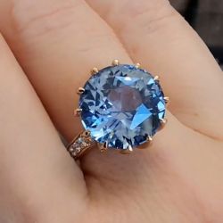 Rose Gold Rotate Shaped Round Cut Engagement Ring