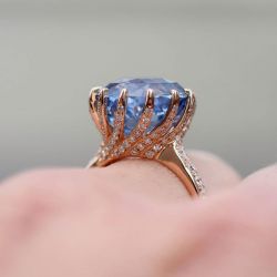 Rose Gold Rotate Shaped Round Cut Engagement Ring