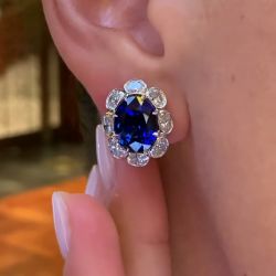 Sleek Bezel Oval Cut Royal Blue Sapphire Stud Earrings