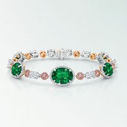 Two Tone Halo Oval Cut Emerald Sapphire Bracelet