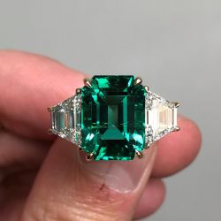 Golden Three Stones Emerald Cut Engagement Ring