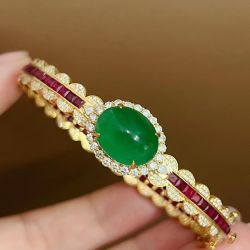 Golden Cabochon Oval Cut Vivid Emerald Sapphire Bracelet