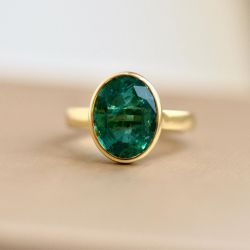 Solitaire Golden Oval Cut Emerald Sapphire Engagement Ring