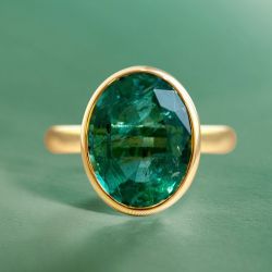 Solitaire Golden Oval Cut Emerald Sapphire Engagement Ring