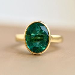 Solitaire Golden Oval Cut Emerald Sapphire Engagement Ring