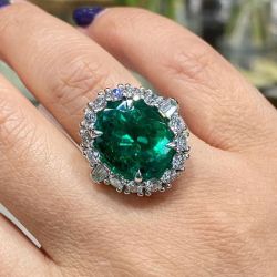Elegant Halo Oval Cut Emerald Sapphire Engagement Ring