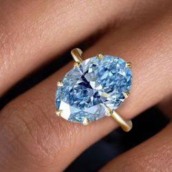 Golden Solitaire Oval Cut Aquamarine Sapphire Engagement Ring