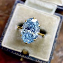 Golden Solitaire Oval Cut Aquamarine Sapphire Engagement Ring
