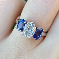 Three Stone Oval Cut White & Blue Sapphire Engagement Ring