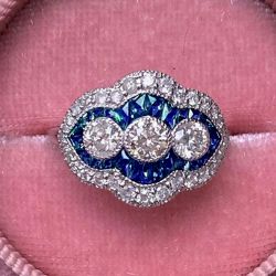 Vintage Halo Round Cut White & Blue Sapphire Engagement Ring