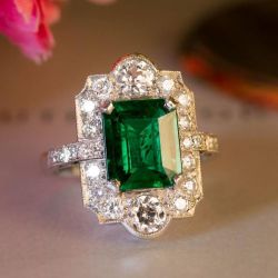 Unique Halo Emerald Cut Emerald Sapphire Engagement Ring