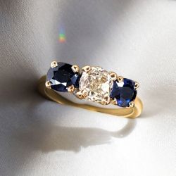 Golden Three Stone Cushion Cut White & Blue Sapphire Wedding Band For Women 