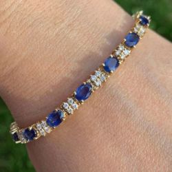 Golden Oval Cut Blue Sapphire Tennis Bracelet For Women