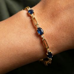 Gold Oval Cut Blue Sapphire Tennis Bracelet For Women