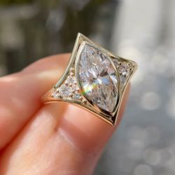 Gold Bezel Marquise Cut White Sapphire Engagement Ring For Women